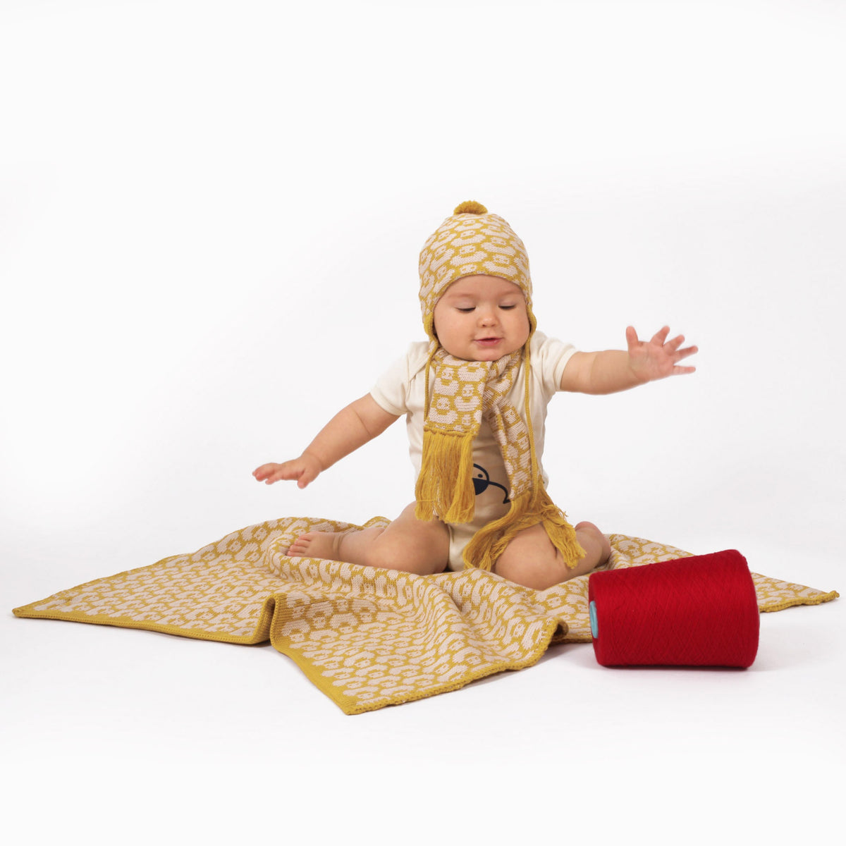 Babydeckemit kleinen Entchen und Häkelborte 100% Wolle (Merino)
