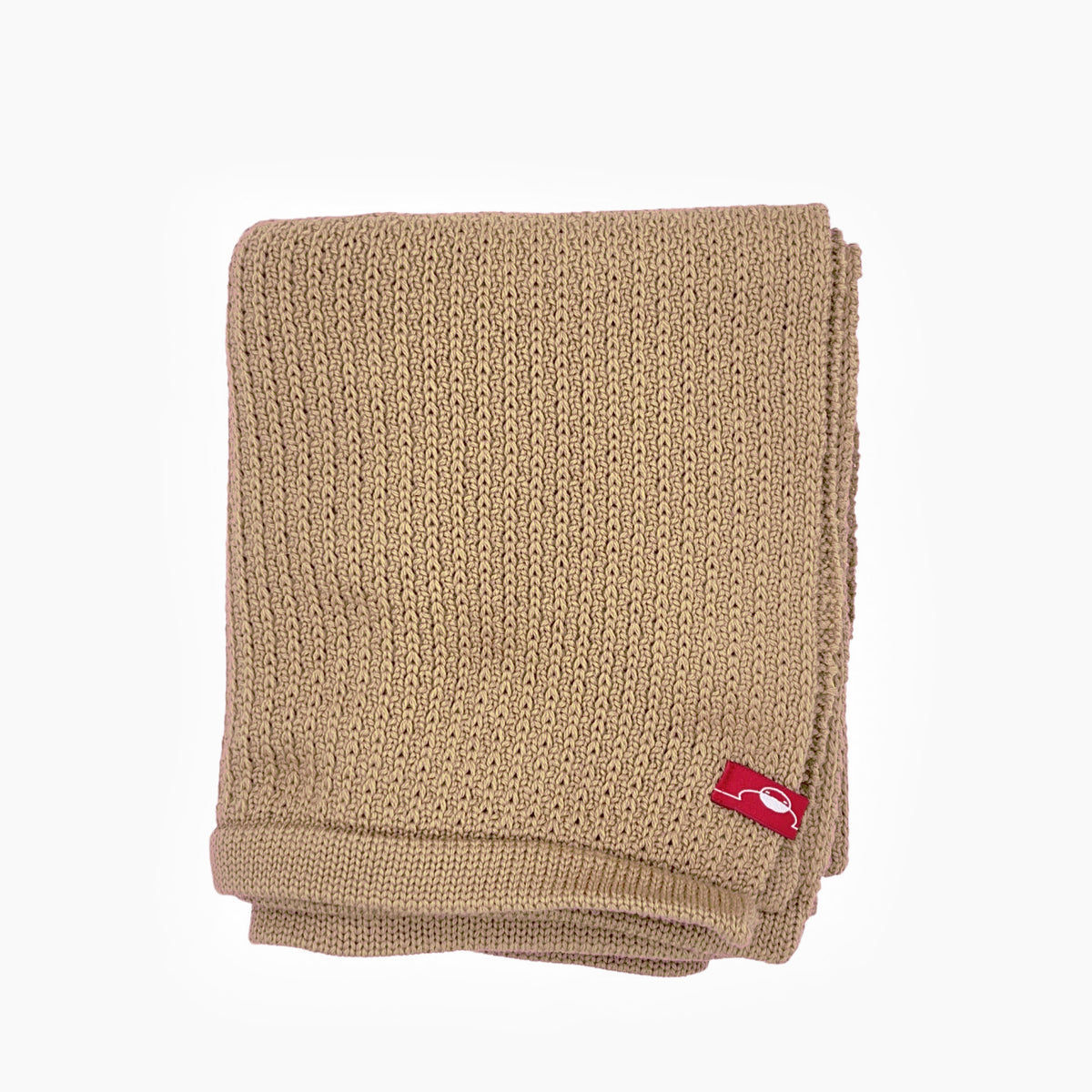 Beige Babydecke im Doubleface-Lochmuster gestrickt, aus feinster Bio-Merinowolle mit rotem vincente-Label. Die Decke mißt ca 75x80cm.