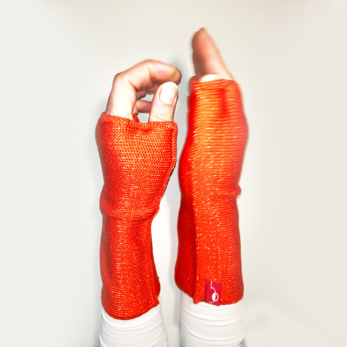 Glitzernde Armstulpen aus Merinowolle mit Daumenloch von vincente®