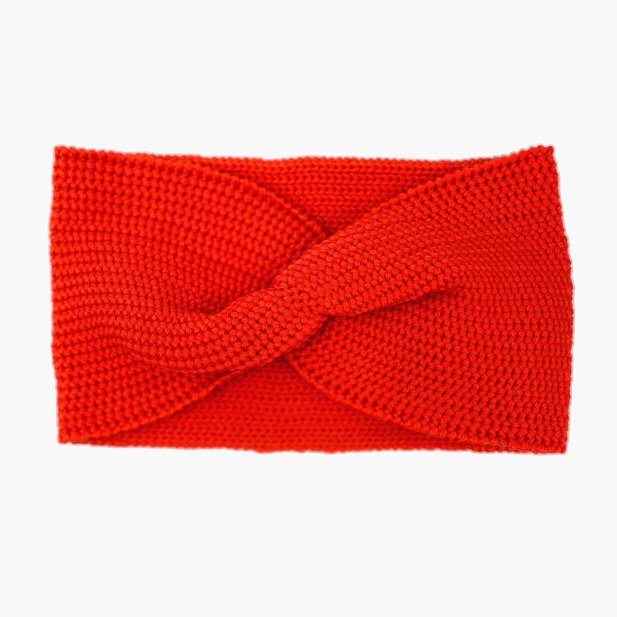 Orangerotes Stirnband mit einer Turban-ähnlichen Verdrehung. Gestrickt im  Doubleface Patentmuster, außen Knötchenstruktur und Innen sieht es wie ein klassisch rechts gestricktes Muster aus.